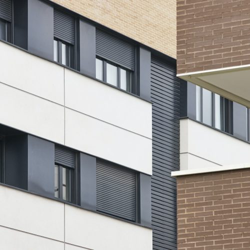 New brick building exterior facade. Construction industry. Buy, rent